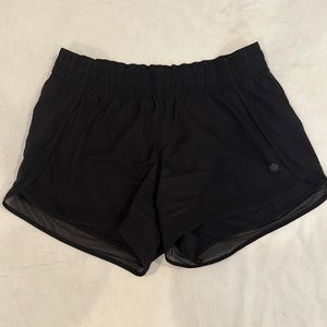 Black running shorts 4”